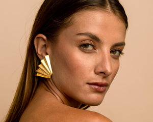 Our model wearing the Fan earrings.